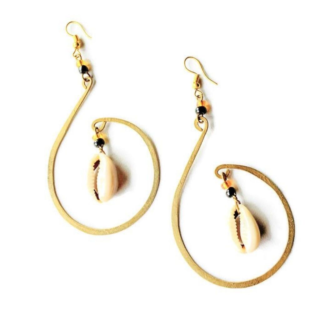 Pair of gold hoop earrings with shell pendants on a white background