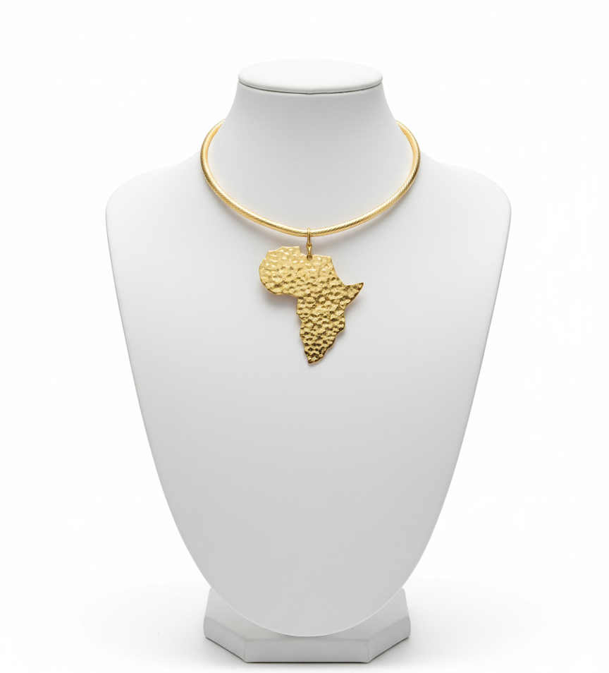Gold necklace with an Africa map pendant on a white mannequin bust.