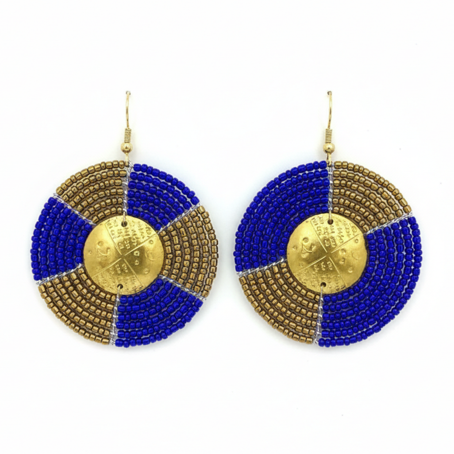 Pair of earrings with blue and gold circular design on a white background