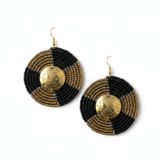 Pair of black and gold beaded earrings on a white background