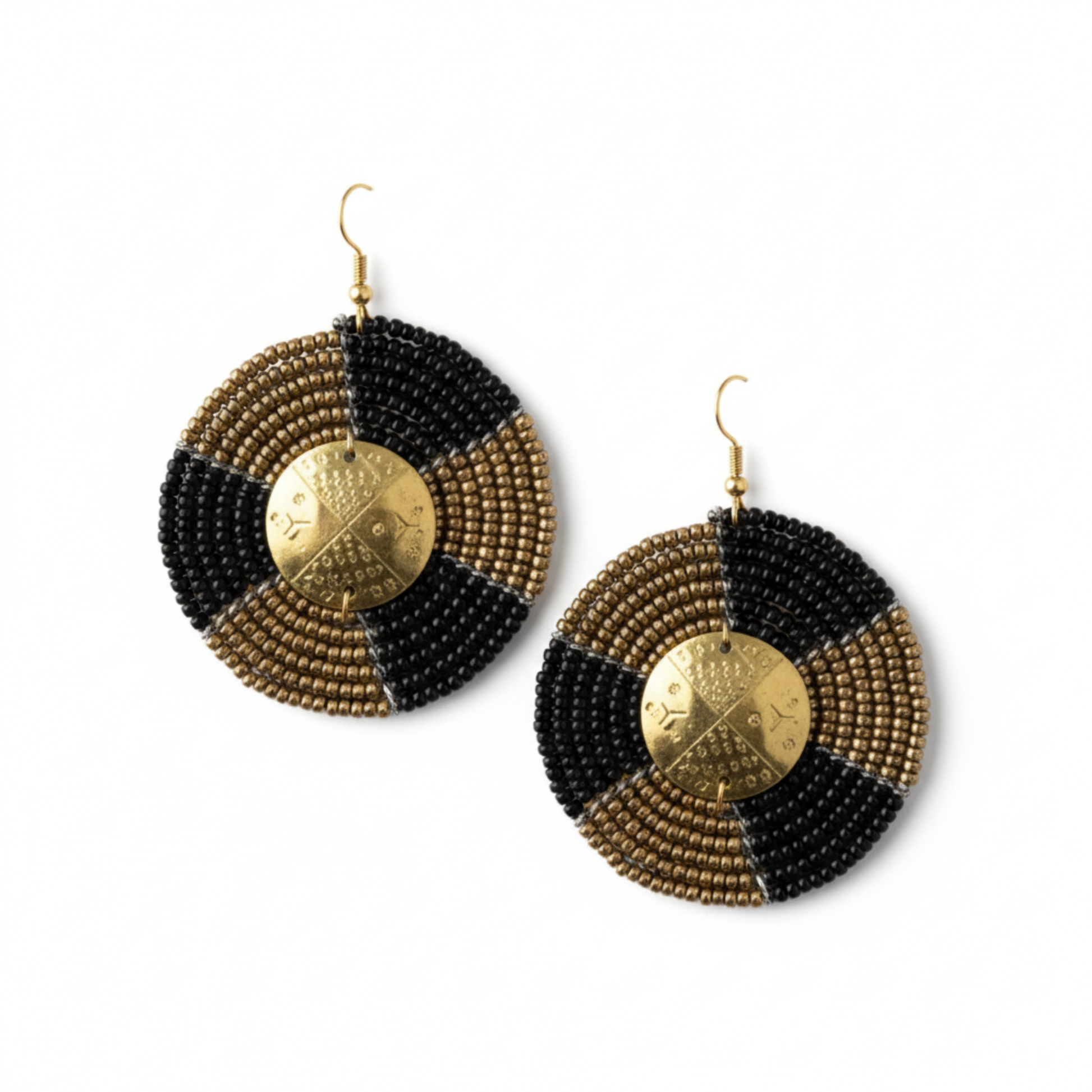 Pair of black and gold beaded earrings on a white background