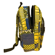 a multicolored geometric patterned backpack with yellow, blue, and white colors visible.