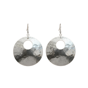 Pair of silver round earrings with a white background