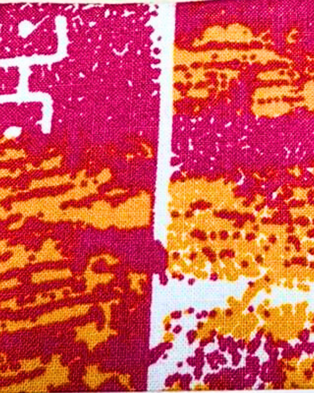 A swatc with red and yellow abstract pattern on a pink and white background