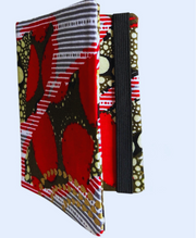 A passport holder with a colorful pattern with a black band on a white background