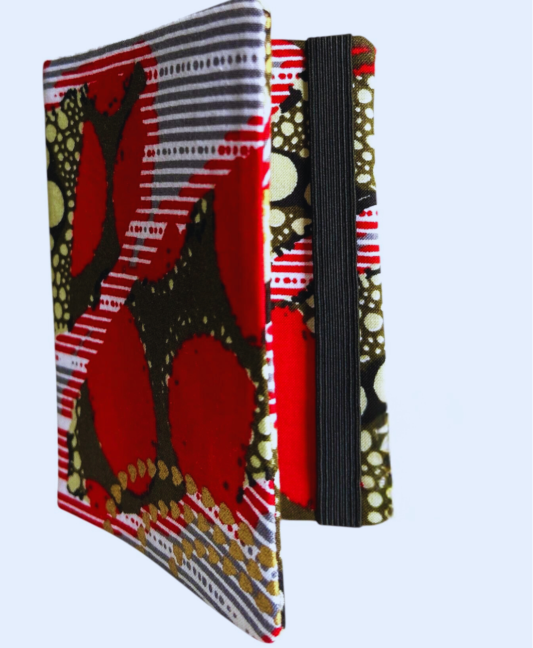 A passport holder with a colorful pattern with a black band on a white background