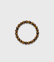 Wooden beaded bracelet on a white background